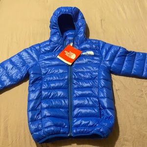 Blue NF puffer jacket.